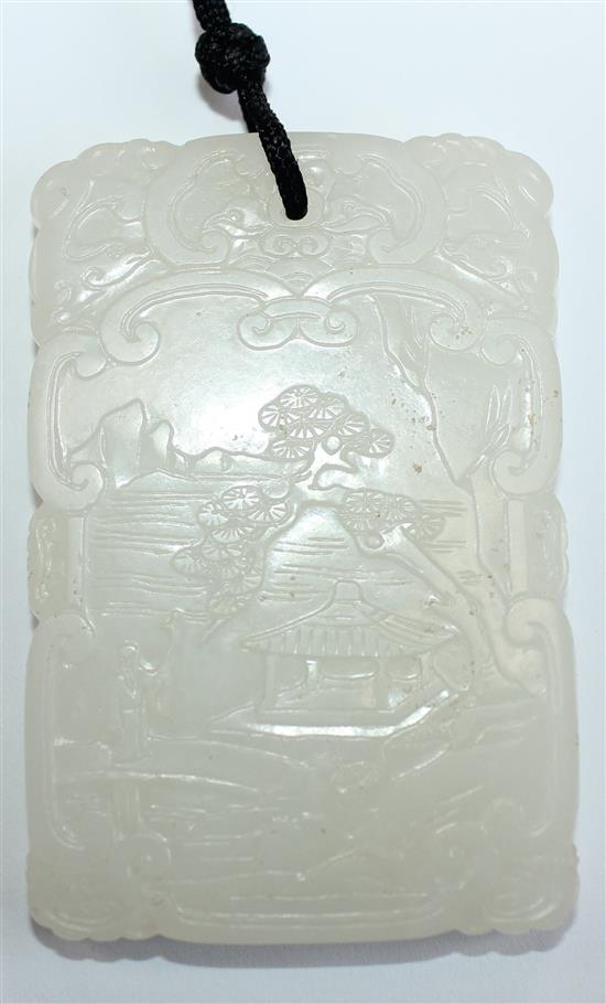 A Chinese white jade plaque, 19th/20th century, 6.5cm